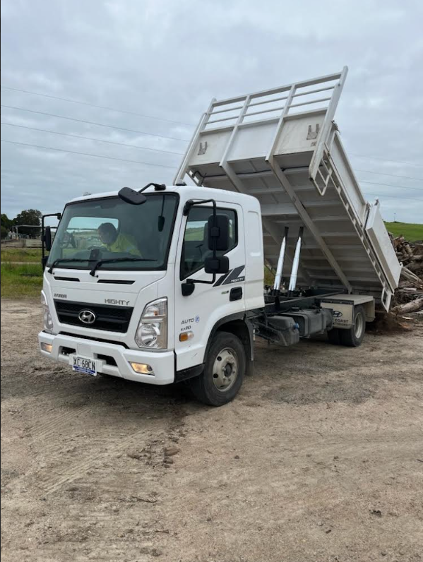 Minespec Hyundai Mighty tipper truck on rural site — South-East Queensland