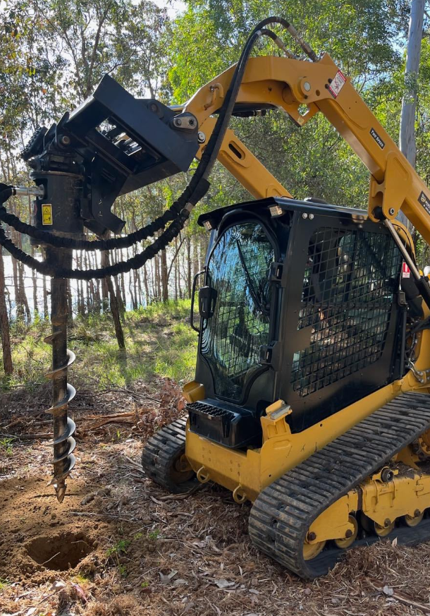 Skid Steer Auger — Minespec Plant Hire Brisbane & Sunshine Coast